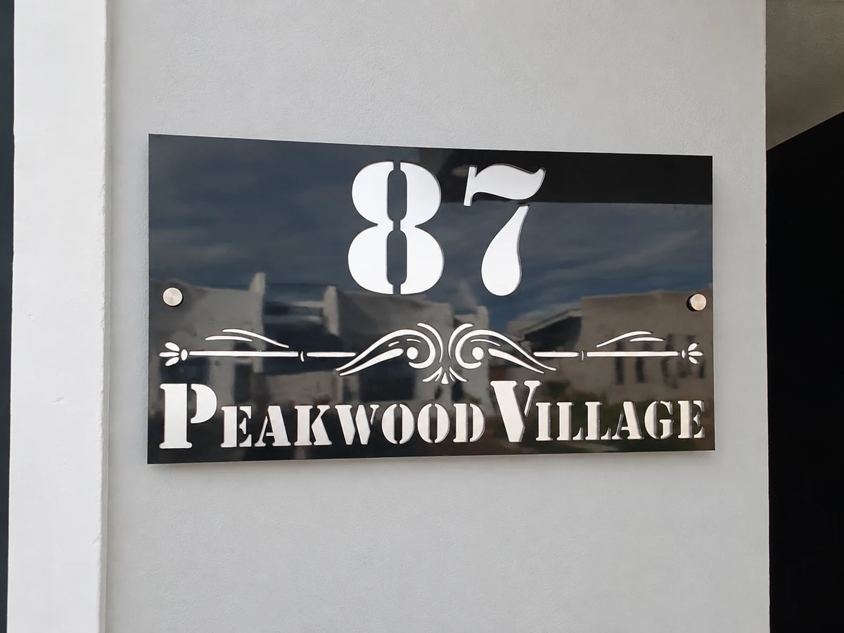 Peakwood Village house number made by H&S Signs
